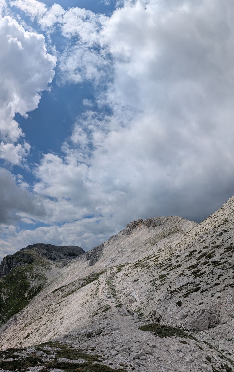 Rugged mountain ridgeline under dramatic sky